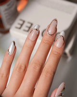 Baroque Pearl M press-on nails in medium almond with jewelry-inspired gold edging
