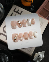 Baroque Pearl handmade press-on nails in extra short oval shape by Joyee Nails