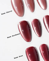 Beam Team #1 handmade press-on nails featuring red cat eye