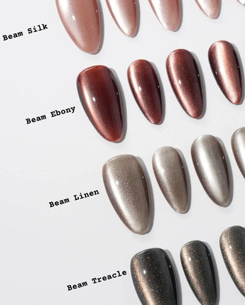 Beam Team #2 handmade press-on nails featuring black cat eye