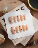 Beebee Nail Art press-on nails in short coffin shape — Warm French, Daisy & Honeybee.