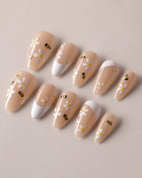 Beebee Nail Art handmade press-on nails featuring Warm French, Daisy & Honeybee.