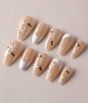 Beebee Nail Art handmade press-on nails featuring Warm French, Daisy & Honeybee.