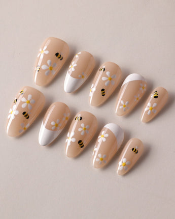 Beebee Nail Art handmade press-on nails featuring Warm French, Daisy & Honeybee.