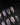 Belladonna press on nails with hand-painted dark lilies in silver outline on violet grey cat eye and nude nails edged in silver beads - image 1