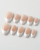 Belle Époque press-on nails in extra short almond shape — classic French tip nails