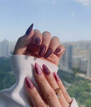 Ruby Red Cat-eye nail set with rich red magnetic shine and polished gel surface