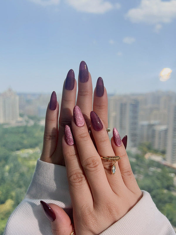 Ruby Red Cat-eye press-on nails with deep ruby magnetic shimmer and glossy finish