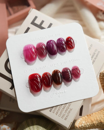 Berry Jelly extra short oval nails with translucent berry tones and wave-carved gel texture