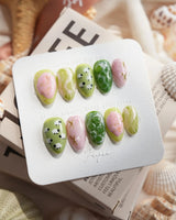 Berry Matcha iced drink press-on nails in extra short almond shape