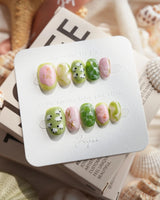 Berry Matcha iced drink press-on nails in extra short oval shape