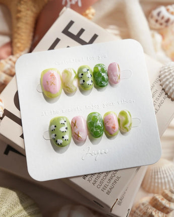 Berry Matcha iced drink press-on nails in extra short oval shape