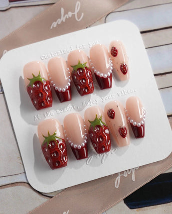 Berry me strawberry season press-on nails with glossy red fruit and nude gel