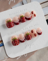 Berry me strawberry press-on nails with high-gloss jelly finish and nude accents