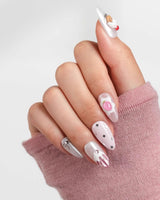 Berry Pudding magical bakery nail set with chrome ribbon bows and scattered stars