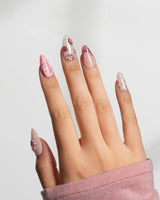 Berry Tart glossy raspberry nails with pearl accents and powdered sugar-like pink dots