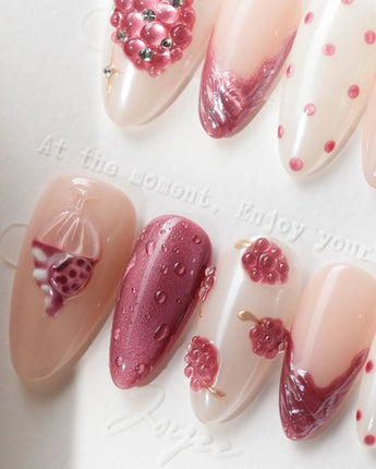 Berry Tart medium almond nails with 3D raspberries, rose-gold details, and sugar accents