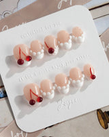 Birthday Cake press-on nails in extra short oval shape — Vintage Cherry Cream, 3D Embossed Textures & Jelly Cherries.