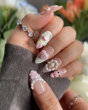 Birthday Party nail art close-up showing Dreamy Candy Style, 3D Bows & Strawberry Cream Cake. details