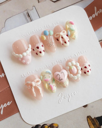 Birthday Party press-on nails in extra short almond shape — Dreamy Candy Style, 3D Bows & Strawberry Cream Cake.