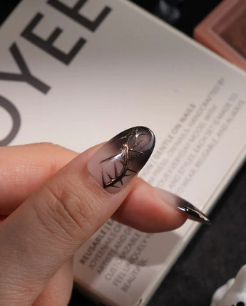 Black Briar handmade press-on nails in medium oval shape by Joyee Nails