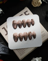 Black Briar handmade press-on nails in extra short almond shape by Joyee Nails