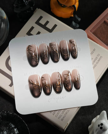 Black Briar handmade press-on nails in medium oval shape by Joyee Nails