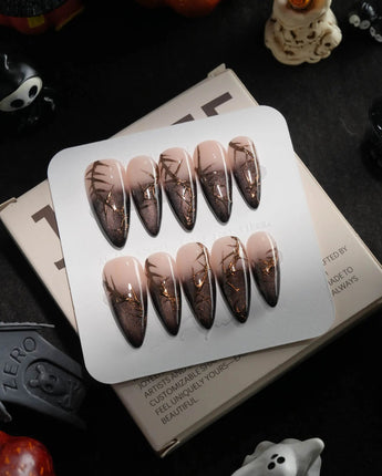 Black Briar handmade press-on nails in medium stiletto shape by Joyee Nails
