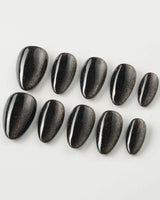Black Cat-eye press-on nails in extra short almond shape — black cat eye