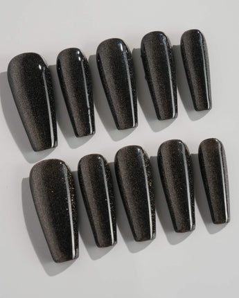 Black Cat-eye press-on nails in long coffin shape — black cat eye