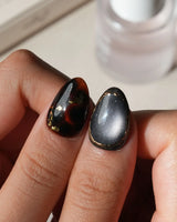 Black Lacquer press on nails with real gold foil in deep amber red and glossy black, gold studs and fine gold pinstripes on cream - image 4