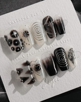 Black & Silver Void press-on nails in short coffin shape — black aura swirl abstract nails