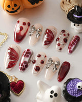 Silver Butterfly handmade press-on nails featuring Silver & Red Gothic, 3D Bows & Blood Drops.