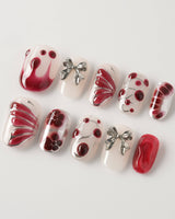Silver Butterfly press-on nails in short oval shape — Silver & Red Gothic, 3D Bows & Blood Drops.