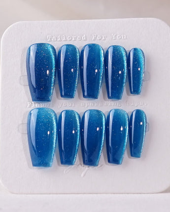 Blue Sky Cat-eye press-on nails in medium coffin shape — Peacock Blue cat eye 