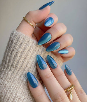 Blue Sky Cat-eye handmade press-on nails featuring Peacock Blue cat eye 