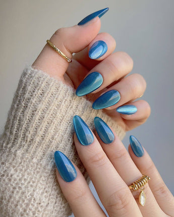 Blue Sky Cat-eye handmade press-on nails featuring Peacock Blue cat eye 