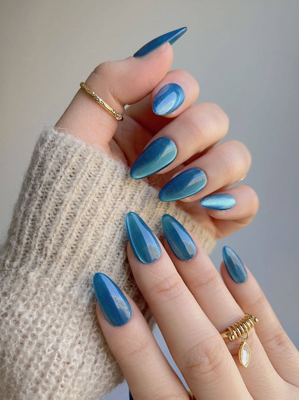 Blue Sky Cat-eye handmade press-on nails featuring Peacock Blue cat eye 
