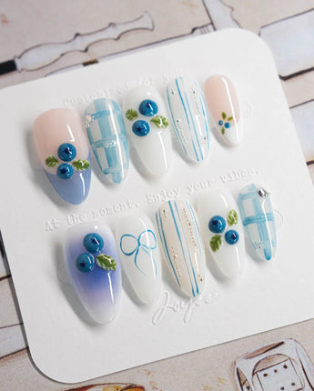 Blue Grid modern blue and white nail art with dimensional blueberry accents