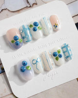Blue Grid fresh summer press-on nails with clean plaid lines and berry details
