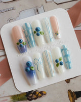 Blue Grid glossy blueberry nail art with cool white and blue checker accents