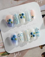 Blue Grid clean summer nail art with frozen berry details and blue grid lines