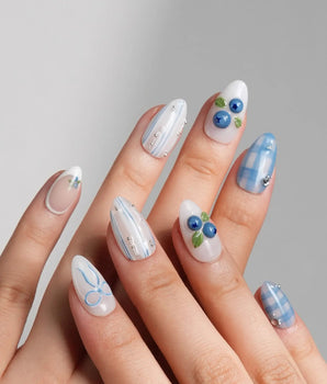 Blue Grid cool-toned blueberry press-on nails with crisp plaid details