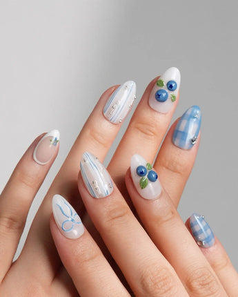 Blue Grid cool-toned blueberry press-on nails with crisp plaid details
