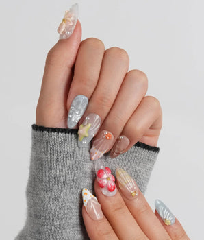 Blue Lagoon medium almond press-on nails with 3D starfish, shells and hibiscus