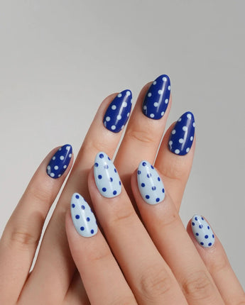 Blue Swirl nail art close-up showing navy blue & light blue Polka Dots details