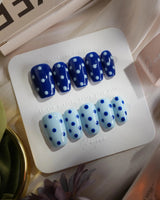 Blue Swirl press-on nails in short coffin shape — navy blue & light blue Polka Dots