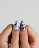 Boo Flicks -Purple press-on nails in medium almond shape — Purple Glitter Halloween, Playful Ghost & Spiderweb.