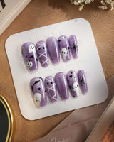 Boo Flicks -Purple press-on nails in medium coffin shape — Purple Glitter Halloween, Playful Ghost & Spiderweb.