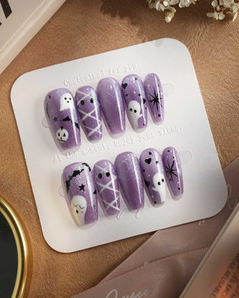 Boo Flicks -Purple press-on nails in medium coffin shape — Purple Glitter Halloween, Playful Ghost & Spiderweb.